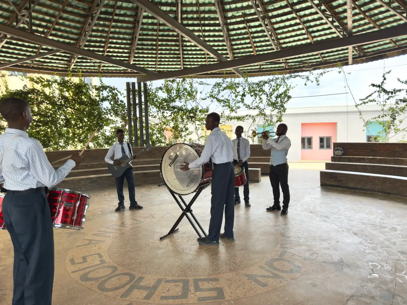 Music Club pupils learning with their instructor